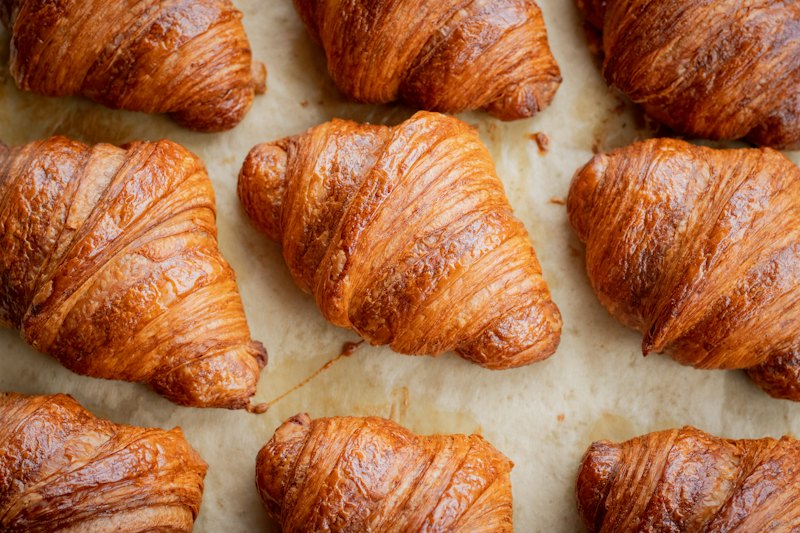 A tray of freshly baked croissants
