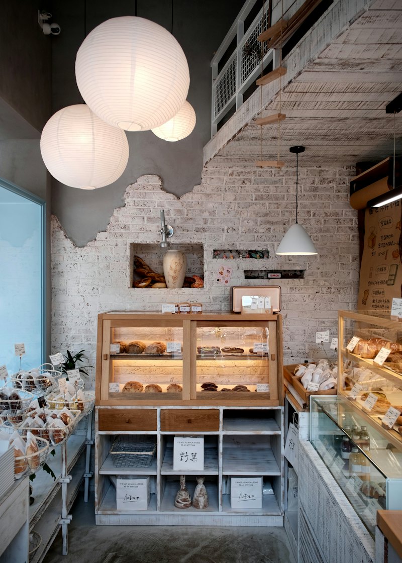 The bright bakery with wooden display cases